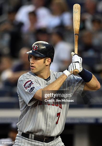 Joe Mauer of the Minnesota Twins bats against the New York Yankees in Game Two of the ALDS during the 2009 MLB Playoffs at Yankee Stadium on October...
