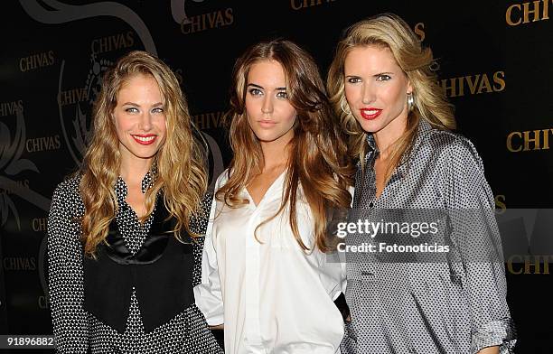 Models Martina Klein, Clara Alonso and Judit Masco attend the "Smoking Chivas Code" fashion show, at the Chivas Studio on October 14, 2009 in Madrid,...