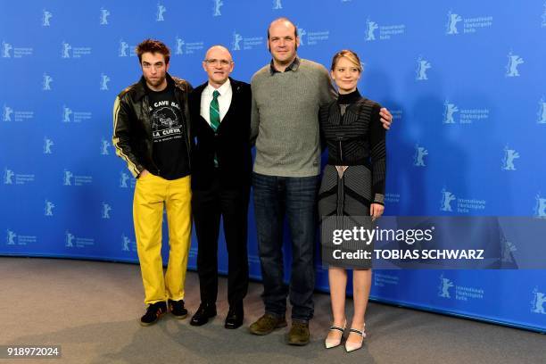 Directors and screenwriters Nathan Zellner and David Zellner pose with British actor Robert Pattinson and Australian actress of Polish origin Mia...