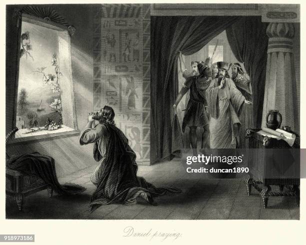 old testament, daniel praying - biblical archaeology stock illustrations