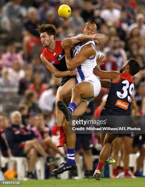 Braydon Preuss of the Kangaroos and Tomas Bugg of the Demons collide during the AFLX match between the North Melbourne Kangaroos and the Melbourne...