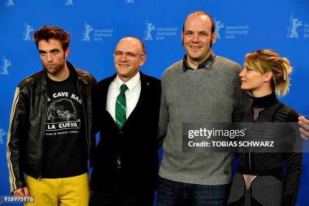 Directors and screenwriters Nathan Zellner and David Zellner pose with British actor Robert Pattinson and Australian actress of Polish origin Mia...