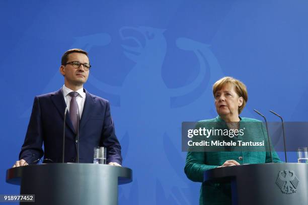 German Chancellor Angela Merkel and new Polish Prime Minister Mateusz Morawiecki upon Morawiecki's speak to thge press during a press conference at...