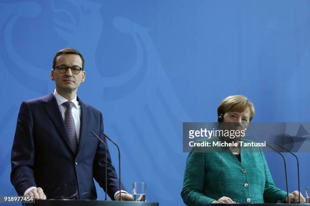 German Chancellor Angela Merkel and new Polish Prime Minister Mateusz Morawiecki upon Morawiecki's speak to thge press during a press conference at...