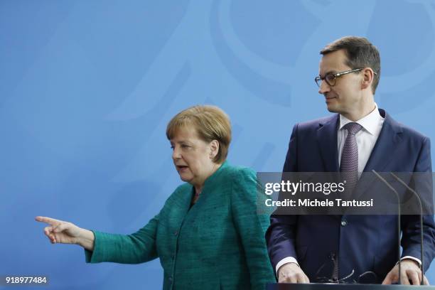 German Chancellor Angela Merkel and new Polish Prime Minister Mateusz Morawiecki upon Morawiecki's speak to thge press during a press conference at...