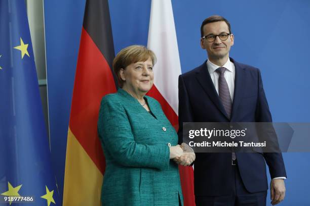 German Chancellor Angela Merkel and new Polish Prime Minister Mateusz Morawiecki upon Morawiecki's speak to thge press during a press conference at...