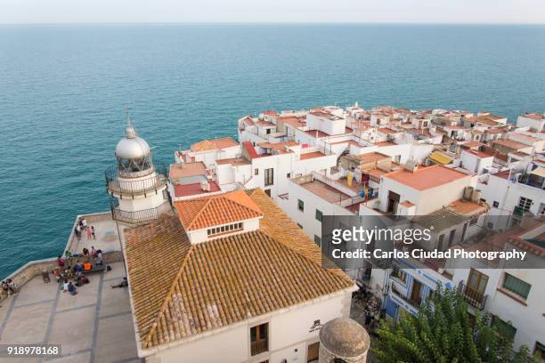 high angle view of the old town and lighthouse of peniscola, castellon, spain - costa_del_azahar stock pictures, royalty-free photos & images