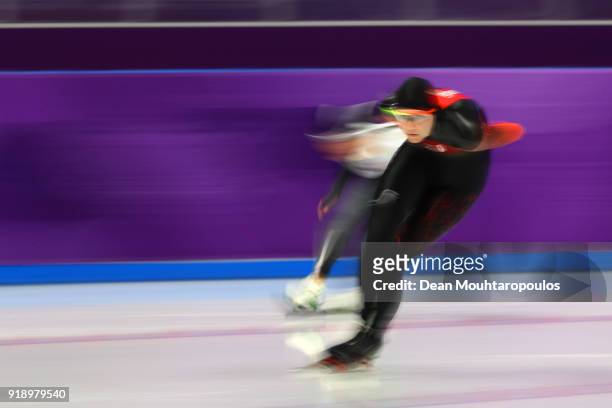 Isabelle Weidemann of Canada and Nana Takagi of Japan compete during the Ladies' Speed Skating 5000m on day seven of the PyeongChang 2018 Winter...