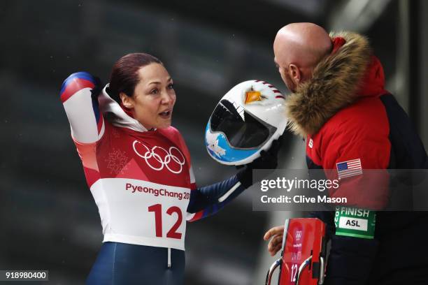 Katie Uhlaender of the United States reacts in the finish area during the Women's Skeleton heat two at Olympic Sliding Centre on February 16, 2018 in...