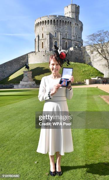 Britain's first astronaut Helen Sharman holds her Companion of the Order of St Michael and St George medal that was presented to her by Queen...