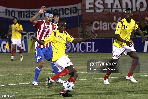 Colombia's Gustavo Adrian Ramos kicks the ball to score against Paraguay during their FIFA World Cup South Africa-2010 qualifier football match at...