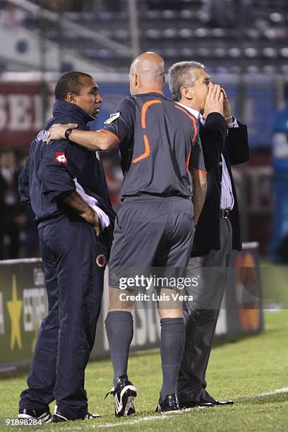 Head coach of Colombia Eduardo Lara , head coach's assistand Jose Maria Pazo and referee Herber Lopez during their match as part of the 2010 FIFA...