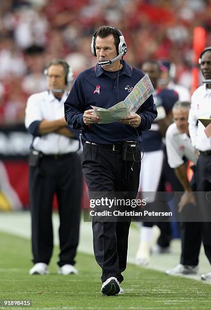 Head coach Gary Kubiak of the Houston Texans walks the sidelines during the NFL game against the Arizona Cardinals at the Universtity of Phoenix...