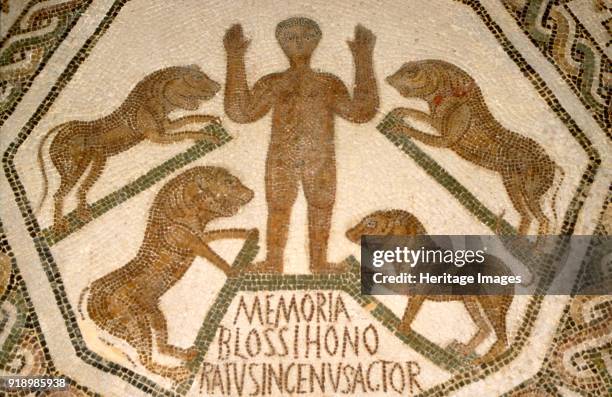 Early Christian/Roman mosaic of Christian attacked by lions, c1st-2nd century. Religion was very important to the Romans. Within the Roman Empire,...