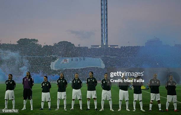 Players of Argentina line up for a photograph during their FIFA World Cup South Africa-2010 qualifier football match at the Centenario Stadium on...