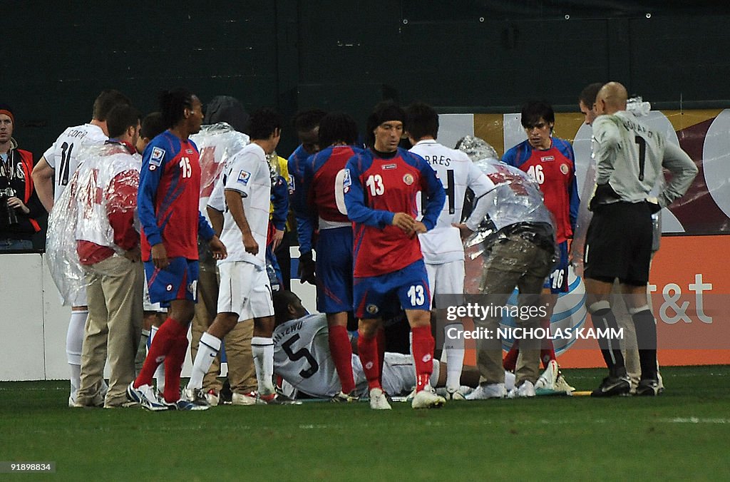 US defender Oguchi Onyewu (on ground) is