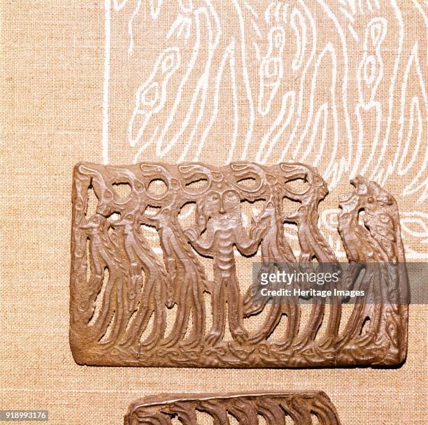Bronze Plaque, illustrating Shamanism and Magic, Kama River Area, USSR, 3rd century BC-8th century. 'Miraculous image' related to Shamanism. At State...