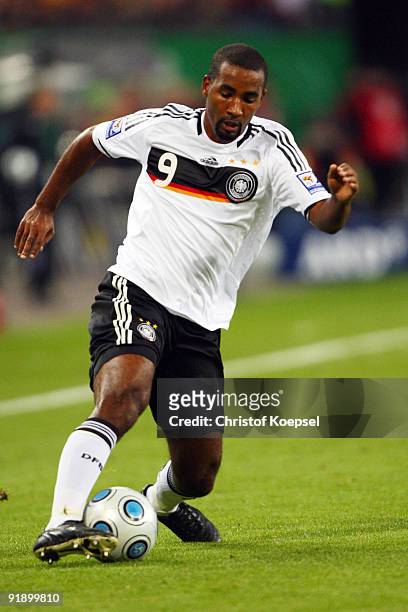 Cacau of Germany runs with the ball during the FIFA 2010 World Cup Group 4 Qualifier match between Germany and Finland at the Hamburg Arena on...