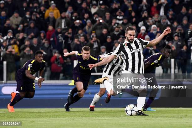 Gonzalo Higuain scores 2-0 goal during the UEFA Champions League Round of 16 First Leg match between Juventus and Tottenham Hotspur at Allianz...