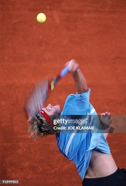 Mardy Fish serves to Karol Kucera of Slovakia during their Davis cup World group play-off match between Slovakia and USA in Bratislava 19 September,...