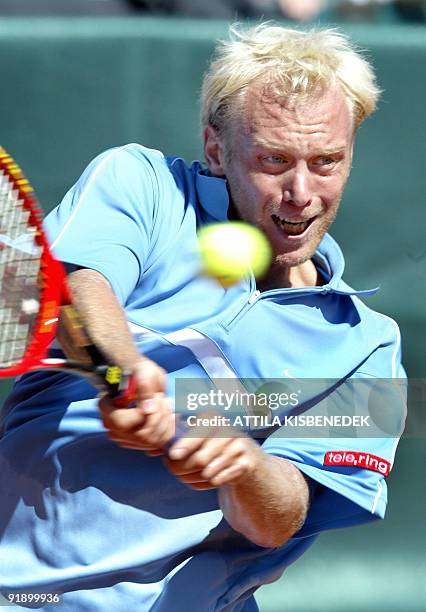 Austrian Stefan Koubek returns a backhand against Belgian opponent Christophe Rochus, 19 September 2003 in Portschach, some 300 kms south-west from...