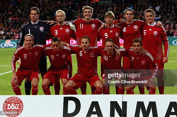 Denmark players pose for a group photograph after the national anthem during the FIFA 2010 group one World Cup Qualifying match between Denmark and...