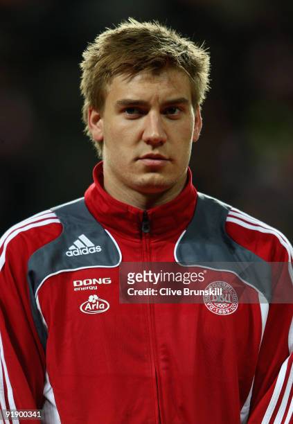 Nicklas Bendtner of Denmark stands for the national anthem during the FIFA 2010 group one World Cup Qualifying match between Denmark and Hungary at...