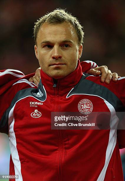 Lars Jacobsen of Denmark stands for the national anthem during the FIFA 2010 group one World Cup Qualifying match between Denmark and Hungary at the...