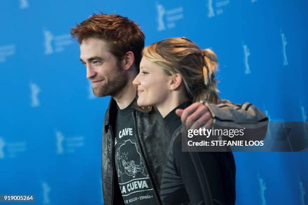 British actor Robert Pattinson and Australian actress of Polish origin Mia Wasikowska pose during a photocall for the feminist western "Damsel"...