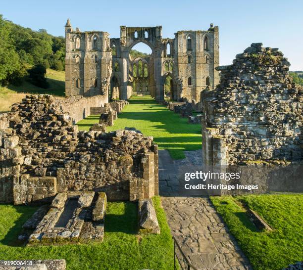 Rievaulx Abbey, North Yorkshire, circa 2015. View of the church from the west, showing the north and south transepts, the nave in the centre and the...