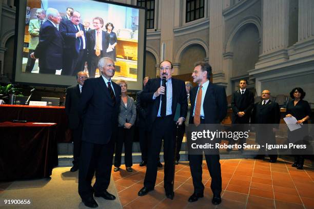 Professor Umberto Eco jokes with Rettore Pier Ugo Calzolari and new Rettore Ivano Dionigi during the ceremony of nomination "Professor Emerito" of...