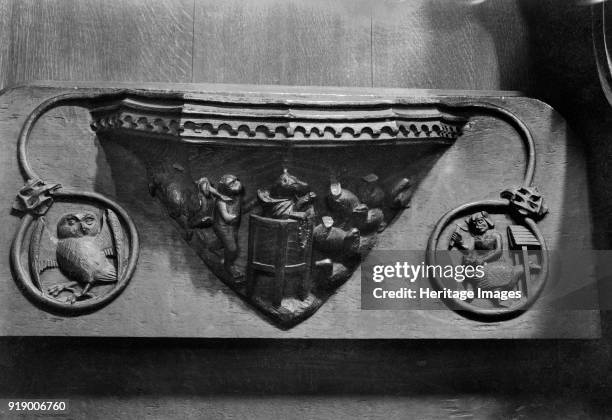 Misericord, Beverley Minster, East Riding of Yorkshire, 1959. Detail of a carved wooden misericord depicting a fox preaching to geese.