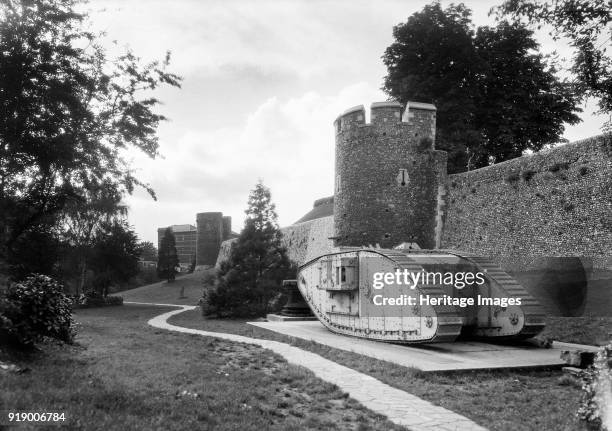 City walls, Canterbury, Kent, 1920-1940. The First World War tank was presented to Canterbury in July 1919 to celebrate the 'Great Peace Day'.