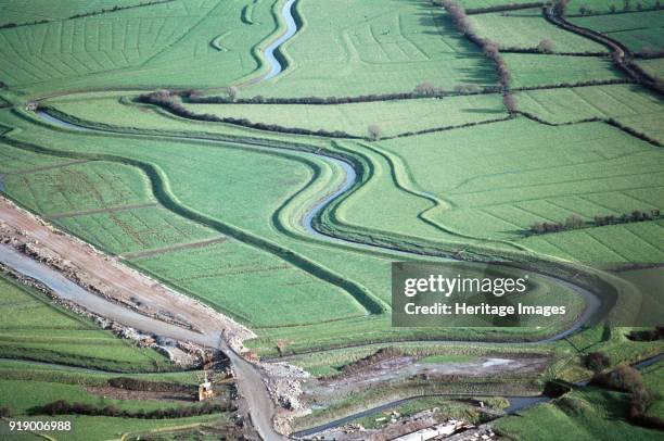 Flood defences alongside the Congresbury Yeo River, Phipps Bridge, North Somerset, 1970. Photographed during construction work on the M5 motorway.