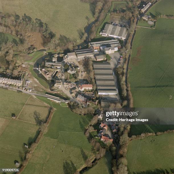 Pymore Mills, near Bridport, Dorset. Aerial view showing a range of mill buildings constructed in about 1850. The mill contains a raw materials...