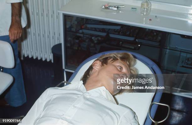 Paris - Claude François gets surgery on the 2 eardrums following the bombing in the Hilton hotel in London