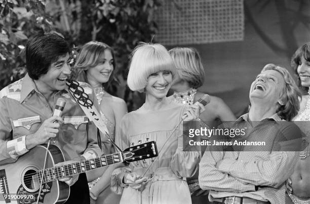 French singers Ringo and Claude François on the set of the french tv show "Midi Trente" hosted by Danielle Gilbert , 20th September 1977