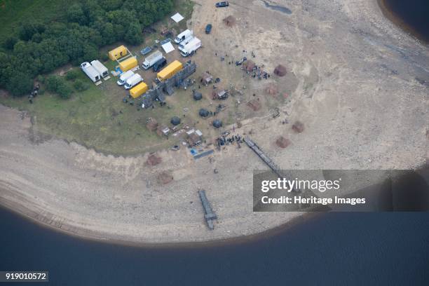 Film set for the television production of 'Beowulf', Derwent Reservoir, Northumberland, 2015. Horses, actors and film crew are all visible, probably...