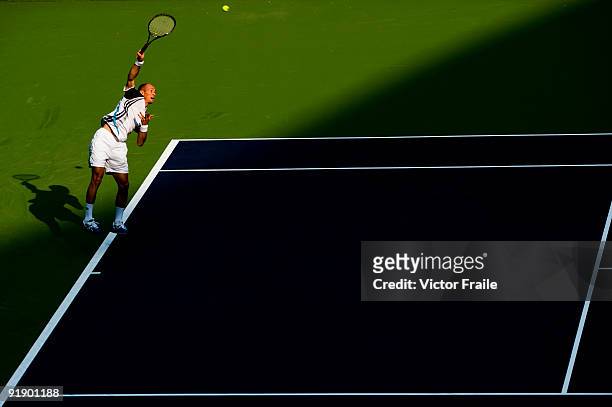Nikolay Davydenko of Russia serves to Fernando Gonzalez of Chile during day five of 2009 Shanghai ATP Masters 1000 at Qi Zhong Tennis Centre on...