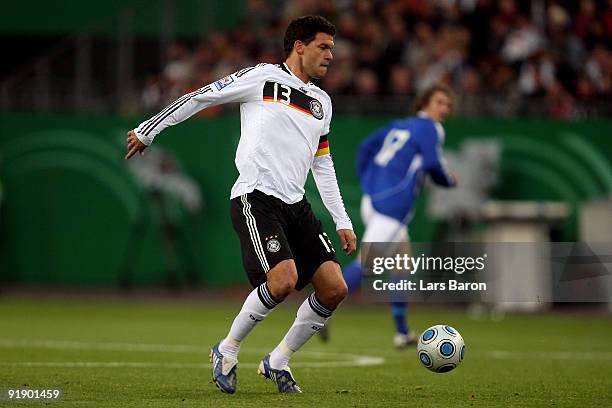 Michael Ballack of Germany runs with the ball during the FIFA 2010 World Cup Group 4 Qualifier match between Germany and Finland at the HSH Nordbank...