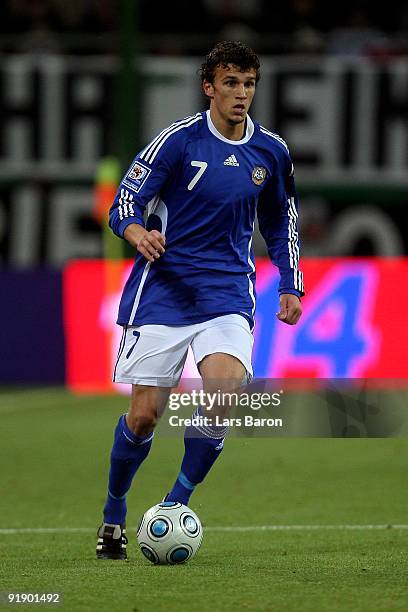 Roman Eremenko of Finland runs with the ball during the FIFA 2010 World Cup Group 4 Qualifier match between Germany and Finland at the HSH Nordbank...