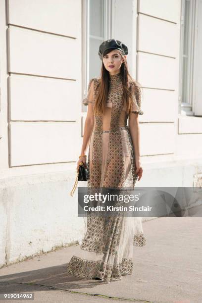 Fashion blogger Diona Ciobanu wears a Dior dress, hat, bag, shoes and underwear day 1 of Paris Womens Fashion Week Spring/Summer 2018, on September...