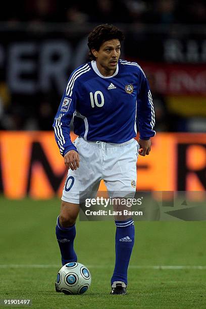 Jari Litmanen of Finland runs with the ball during the FIFA 2010 World Cup Group 4 Qualifier match between Germany and Finland at the HSH Nordbank...