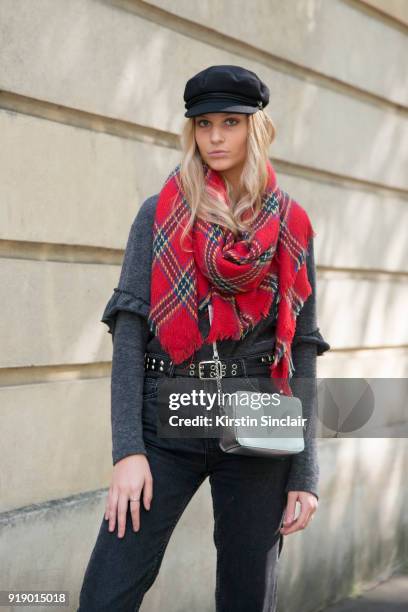 Model wears a chequered scarf day 1 of Paris Womens Fashion Week Spring/Summer 2018, on September 26, 2017 in London, England.