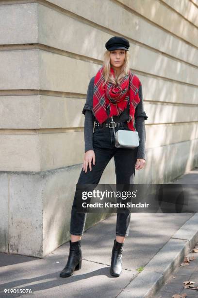 Model wears a chequered scarf day 1 of Paris Womens Fashion Week Spring/Summer 2018, on September 26, 2017 in London, England.