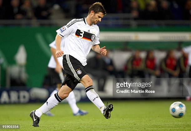 Arne Friedrich of Germany runs with the ball during the FIFA 2010 World Cup Group 4 Qualifier match between Germany and Finland at the Hamburg Arena...