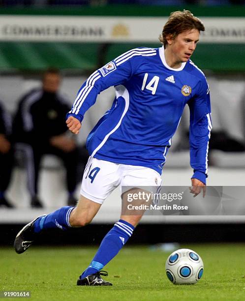 Kasper Haemaelaeien of Finland runs with the ball during the FIFA 2010 World Cup Group 4 Qualifier match between Germany and Finland at the Hamburg...