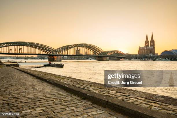 cologne at sunset - kölner dom stock-fotos und bilder