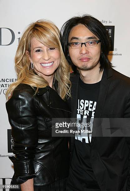 Karen Watkins, Executive Vice President for Christian Dior and Photographer Quentin Shih pose during the arrivals for the Christian Dior Gala W/...