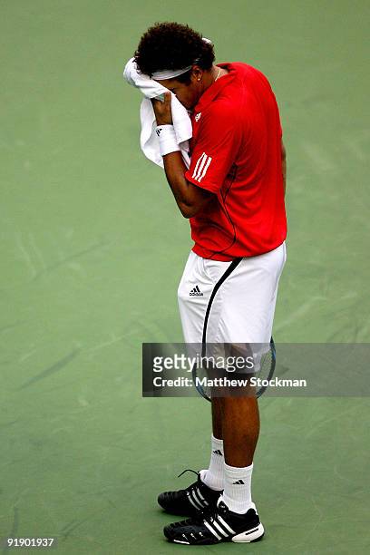 Jo-Wilfried Tsonga of France wipes his face between points against Robin Soderling of Sweden during day five of the 2009 Shanghai ATP Masters 1000 at...